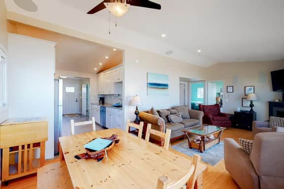 Beachfront home with ocean facing deck and ocean views throughout modern kitchen