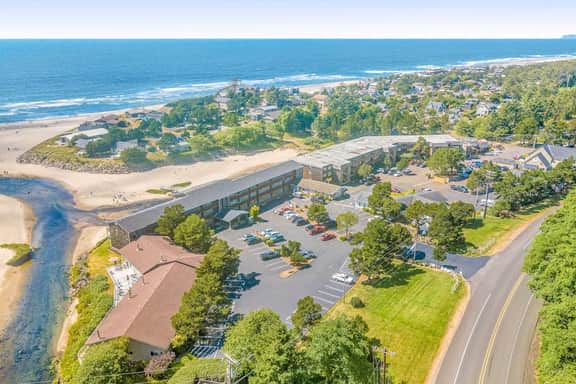 Creekfront Condo with Private Patio Beach Access Shared with D Gas Grill and Views