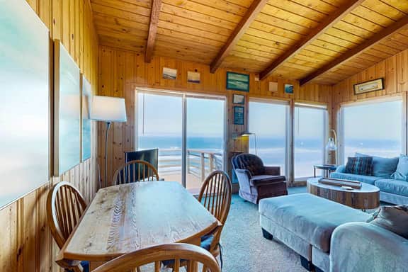 Ocean front home with spacious deck and beach access near shops and restaurants