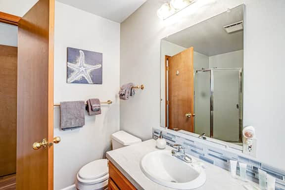 Cozy Home with Wood Stove WiFi Gas Grill and Large Deck Walk to Beach