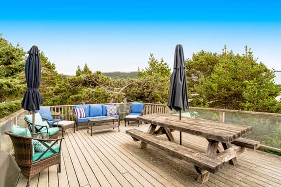 Dog friendly home across street from beach with rooftop deck and views