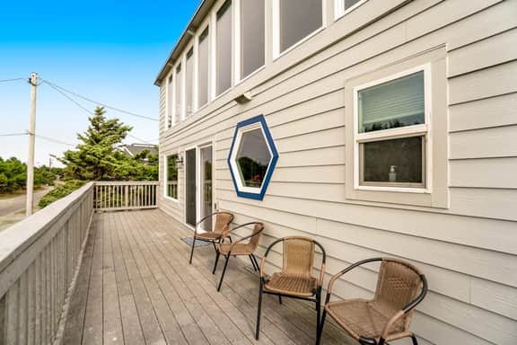 Dog friendly home across street from beach with rooftop deck and views