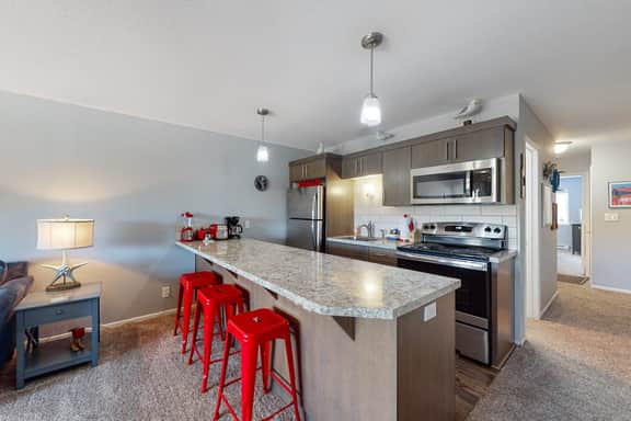 Third floor beachfront condo with a balcony full kitchen and ocean views