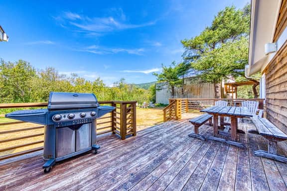 Lakefront home with furnished deck firepit and amazing views walk to the beach