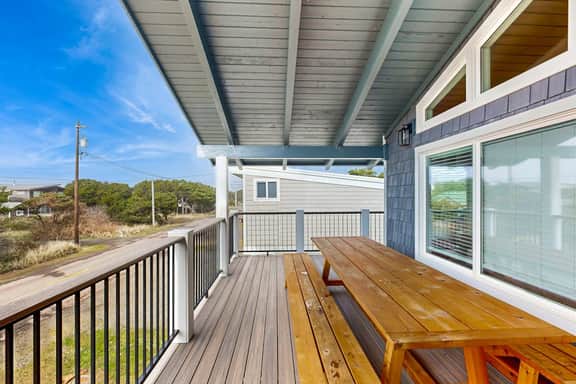 Renovated home near beach access with two kitchens and fireplace dog friendly