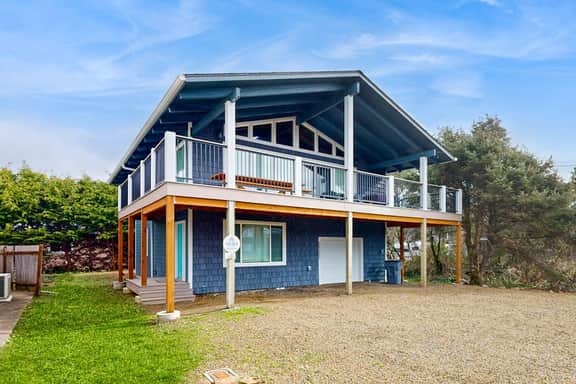 Renovated home near beach access with two kitchens and fireplace dog friendly