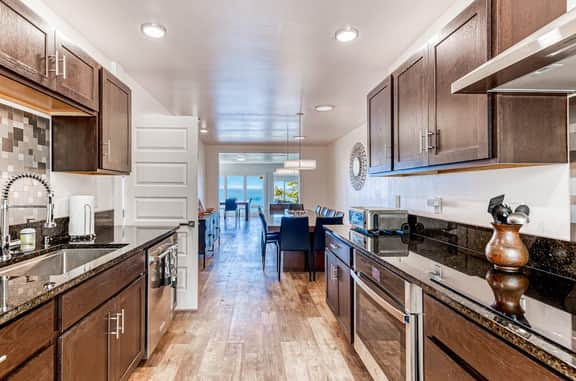Spacious ocean view home with wood fireplace grill and deck dog friendly