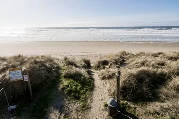 Coastal Paradise Awaits Spacious Retreat with Firepit and Entertainment - Image 3