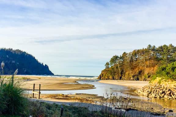Dog friendly riverfront suite at oceanfront Proposal Rock Inn steps to beach