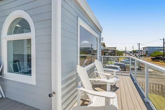 Dog friendly ocean view home with deck and enclosed yard 1 block to beach