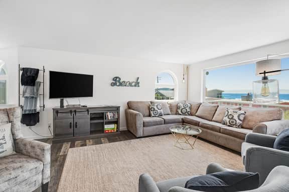 Dog friendly ocean view home with deck and enclosed yard 1 block to beach