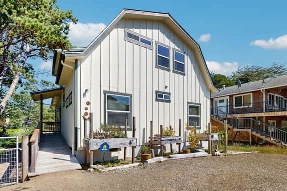 Newly constructed home with firepit and large deck walk to the beach and golf