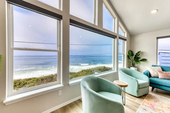 Oceanfront dog friendly home with hot tub and huge view steps to beach access