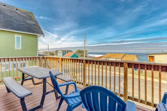 Ocean view home 1 block from the beach with hot tub deck and fireplace