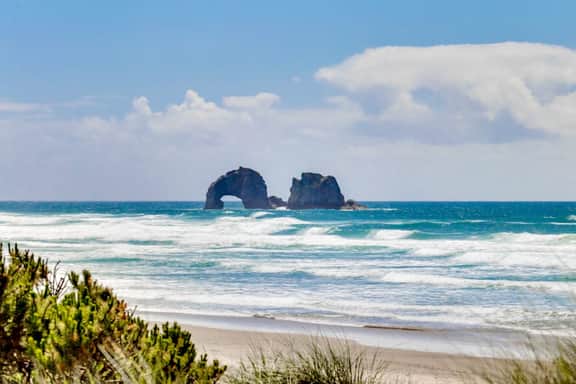 Oceanfront condo with a full kitchen balcony and sweeping sea views