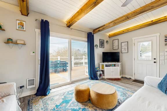 Charming modern home close to the beach with full kitchen WiFi and large deck