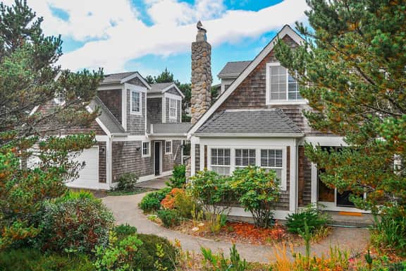 Dog friendly beach house with private hot tub free WiFi game room and ocean views