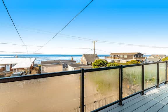 Bright home with stunning ocean views private hot tub and nearby beach access