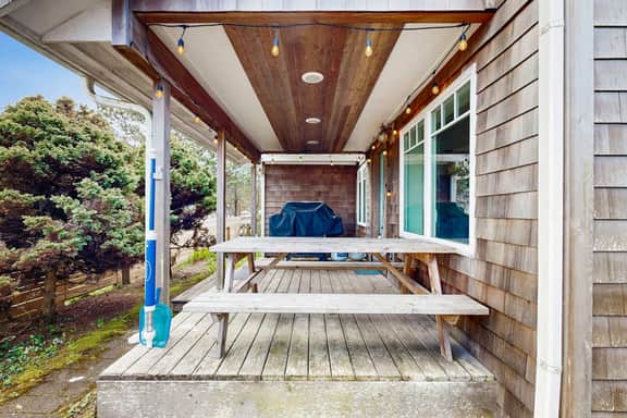 Dog friendly beach home with firepit private hot tub beach access and arcade