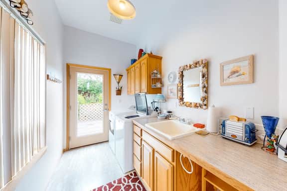 Comfy beach home with ocean views free WiFi private washer dryer and deck