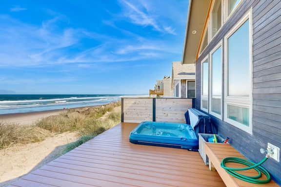 New oceanfront home with hot tub views A C and beach access 2 dogs OK