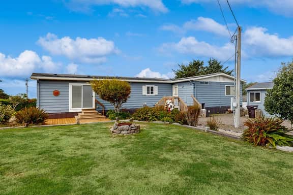 Classic home with partial ocean views and horseshoe pit close to beach