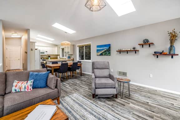 Home with gas fireplace washer dryer and 2 outdoor spaces walk to beach