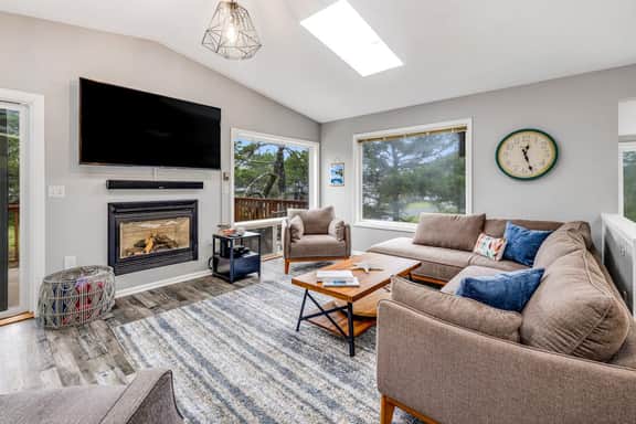 Home with gas fireplace washer dryer and 2 outdoor spaces walk to beach