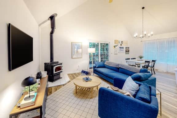 Renovated three story home by the beach with a furnished deck and washer dryer