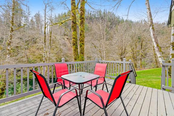 Dog friendly waterfront home on the Wilson River with great views deck and WiFi
