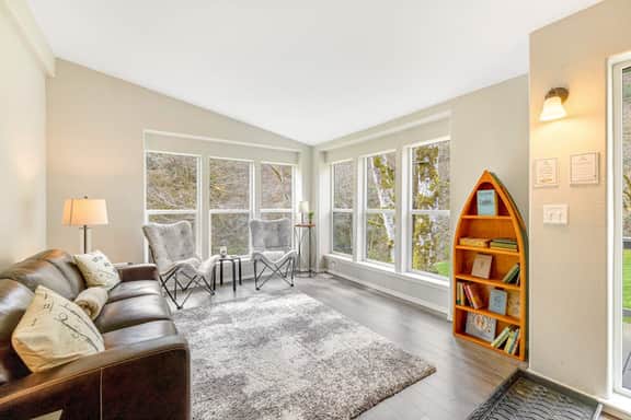 Dog friendly waterfront home on the Wilson River with great views deck and WiFi