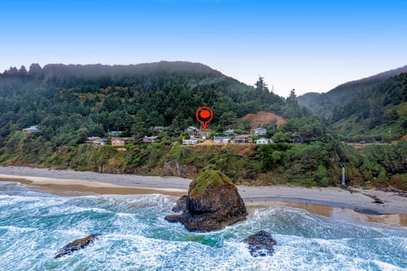 Cozy dog friendly home with ocean views a private hot tub and washer and dryer