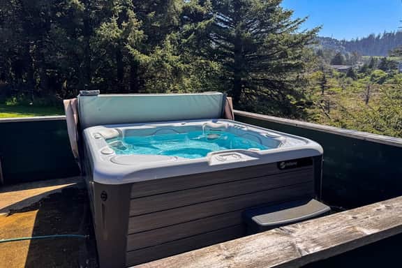 Ocean and lake view home with private hot tub and beach access