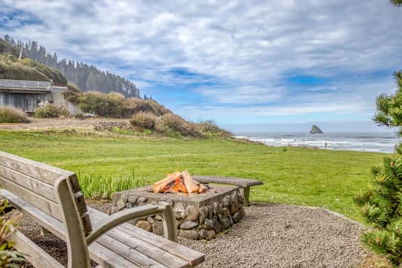 Oceanfront cottage with hot tub beach access fireplace and WiFi Dog friendly