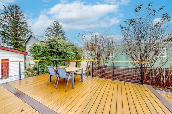 Renovated dog friendly cottage with a covered porch deck yard and washer dryer