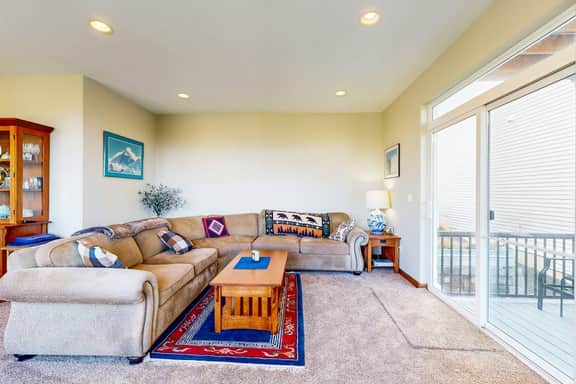 Comfortable home with ocean views with private hot tub deck fireplace WiFi