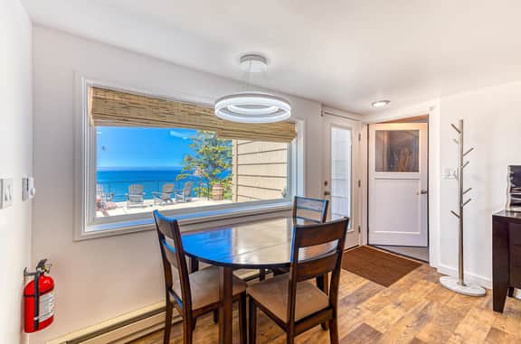 Quaint ocean view escape with modern interior smart TV and gorgeous deck - Image 4