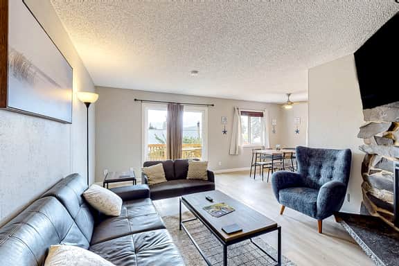 Water view retreat with scenic deck grill yard fireplace board games and with D - Image 2