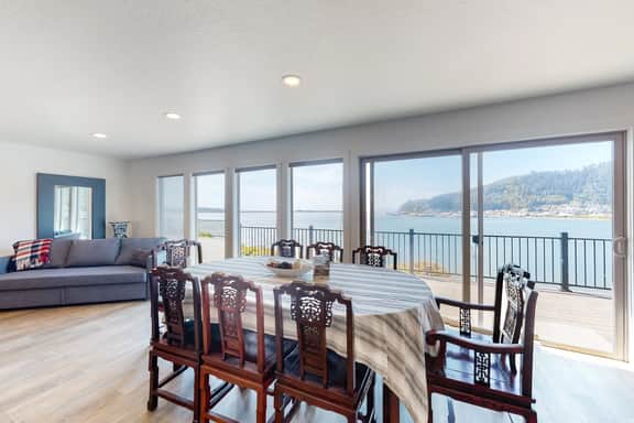 Bayview home with a deck overlooking the locally famous Ghost Hole fishing spot - Image 4