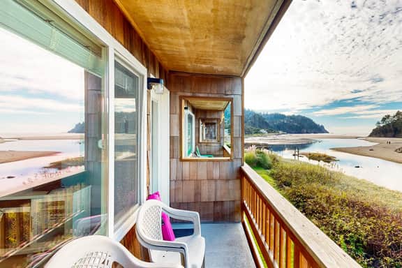 Creekside condo with beach access balcony full kitchen and ocean views - Image 2