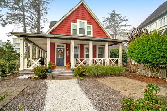 Romantic Oregon Coast Escape with Porch, Fireplace & Garden Charm