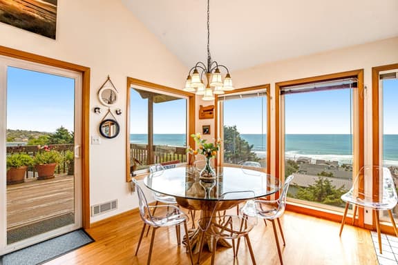 Limited Time Deals Coastal Hideaway with Ocean Views and Spacious Deck