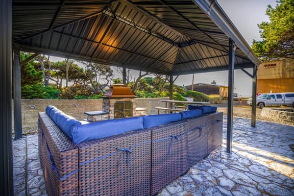 Renovated lake ocean view retreat with hot tub outdoor living and fireplace