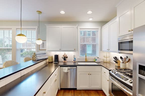 Beautiful home with peek a boo beach views patio with hot tub and firepit WiFi