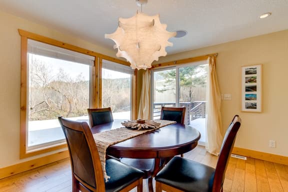 Lakefront home with furnished deck firepit and amazing views walk to the beach
