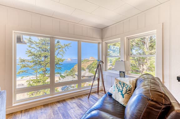 Spacious ocean view home with wood fireplace grill and deck dog friendly