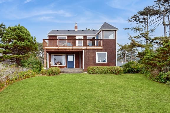 McKinnon's beach house oceanfront with beach views deck patio and fireplace dog friendly - Image 1