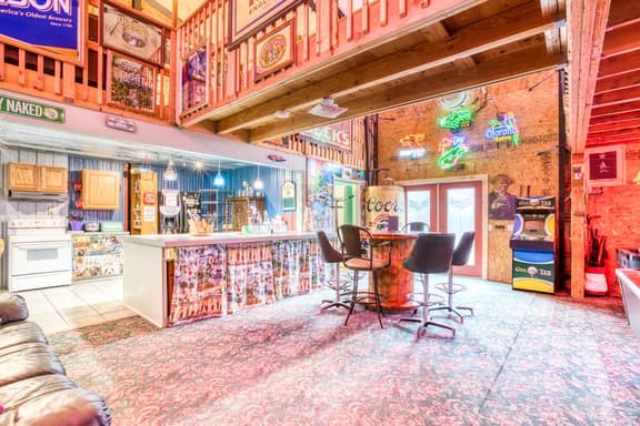 Incredibly Unique Bar Inspired Home with Private Hot Tub and near the Beach Dogs OK