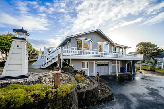 Homey dog friendly house with partial ocean views gas fireplaces and gas grill
