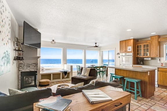 Charming dog friendly waterfront beach home with lovely patio